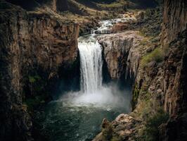 A Strong And Primal Waterfall With A Steep Drop photo
