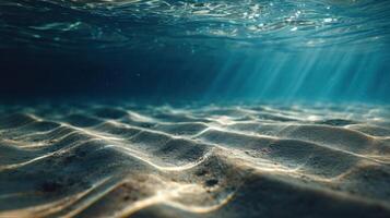 Beams Of Sunlight On The Sandy Bottom Underwater photo
