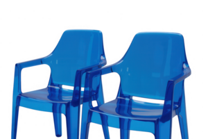 Two vibrant blue plastic chairs sit side by side against a stark transparent background png