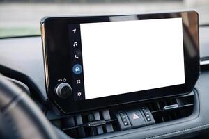 Close-up of the screen on the car dashboard. White screen. Mockup for your advertising. photo