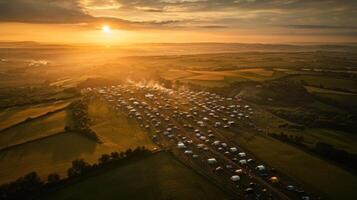 An aerial view of a large field with tents photo