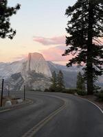 The road leading to Glacier Point in Yosemite National Park, California, USA with the Half Dome in the background. photo