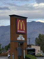 California, USA 09.19.2024 Lone Pine A large red and white sign for Mcdonalds photo