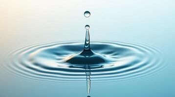A single droplet of water delicately poised above a reflective surface, creating a mesmerizing array of concentric ripples. photo