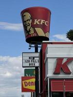 California, USA 09.19.2024 Bishop A large KFC sign is on a pole photo
