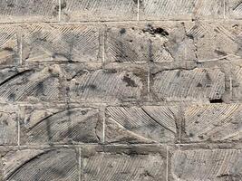 A wall made of stone and cement photo
