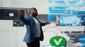 Black engineer explores algorithm design and binary code with high tech AI tools, programming code for automation and innovation. Connection to IT systems and the futuristic world. Camera A. video