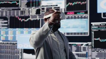 Business leader working with virtual reality headset to obtain funds, reviewing performance reports on dashboards for development plan. 3d simulation to analyze financial situation. Camera B. video