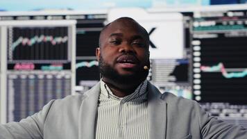 African american presenter hosting a business conference event to inspire vision, sharing insight on development strategy and offering new ideas for global expansion. Public speaker. Camera B. video