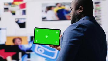 Social media environment with a person using copy space device, surrounded by tech visuals, infographics and digital apps. Emphasizing communication and web entertainment. Camera B. video