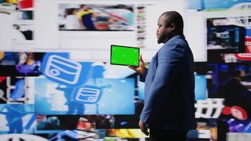 Social media environment with a person using copy space device, surrounded by tech visuals, infographics and digital apps. Emphasizing communication and web entertainment. Camera A. video