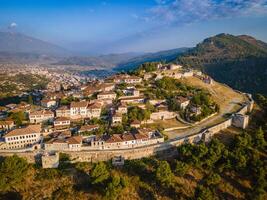 Aerial view of the old Castle in Berat and its ancient neighborhoods in sunset light photo