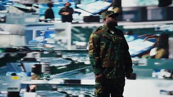 African american military soldier engaged in tactical command and surveillance activity, collect intelligence for AI warfare systems efficiency in a national defense mission. Camera A. video