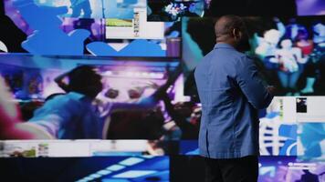 Young social media expert connecting on social network for trends on dashboard, showcasing user interface and digital web platforms. Power of technology, influence and internet presence. Camera A. video