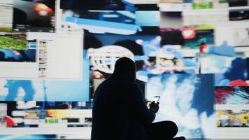 Black male user suffering from mental health issues due to toxic network, illustrating the overwhelming bad impact of internet trends, manipulation and the paranoia of comparison. Camera A. video