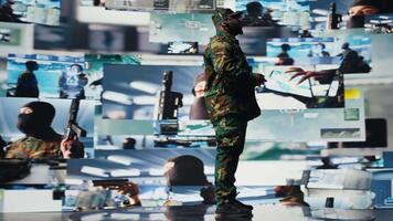 African american man transmitting crucial battlefield information to soldiers, reviewing satellite data in a high tech command center. War planning through tactics for protection. Camera A. video
