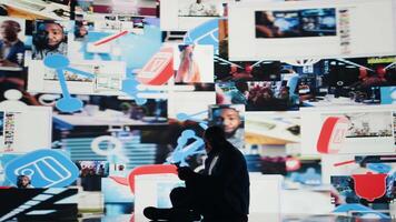 African American man symbolizing social anxiety due to information overload, suffering from an overwhelming impact of online content and mobile phone overuse. Mental health issues. Camera A. video