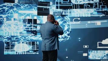 High tech concept of black IT professional exploring artificial intelligence, showcasing machine learning algorithms and systems, neural networks and futuristic data science. Camera A. video