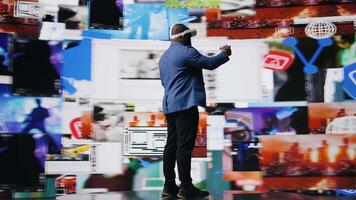 African american media user immersed in visual environment with VR headset, representing communication, e commerce and online entertainment. Social networking powered by digital tools. Camera A. video