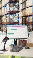 Vertical Package tracking software system follows the parcels shipped via awb numbers tracking, empty warehouse with huge shelving units and racks. Local brand storehouse facility. video