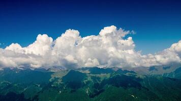 Far mountain and clouds time lapse video