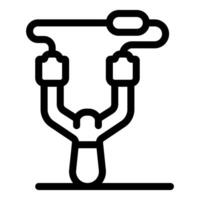 Wooden slingshot standing on a surface with rubber band attached vector