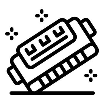 Harmonica lying on a surface, creating a sense of musical anticipation vector