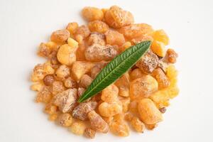 Frankincense olibanum aromatic resin isolated on white background used in incense photo
