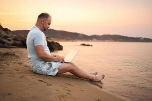 Creating memories while enjoying a beautiful beach sunset with family photo