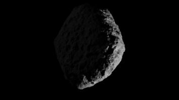 Looping 3D animation of a space asteroid rotation. Cyclic slow rotation of an object in space. File with Alpha Channel. video