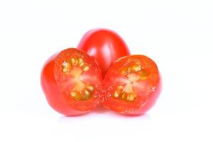 Half sliced cheery tomato isolated on white photo