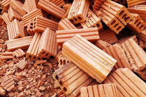 pile of construction bricks for pattern and background photo