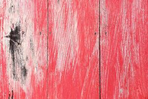 red painted on old wood for background and design photo