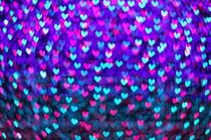multicolored neon blur heart shape light from camera lens for pattern and background. photo
