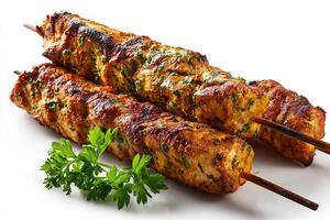 Grilled chicken kababs garnished with vibrant flat parsley leaves photo