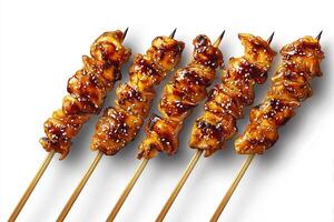 Juicy grilled chicken skewers lined up in a row for a delicious summer barbecue photo