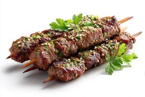 High quality photo of cumin beef kababs grilled to perfection on white background