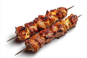 Realistic grilled kababs with charred tips served on clean white background photo