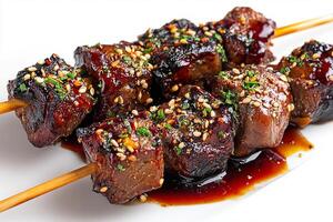 Authentic Moroccan grilled beef skewers with charred edges served on white surface photo