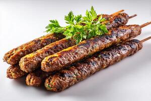High quality photo of grilled Indian seekh kababs isolated on clean white background