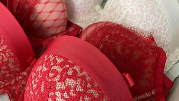 Close up of red and white lingerie in a shop window. photo