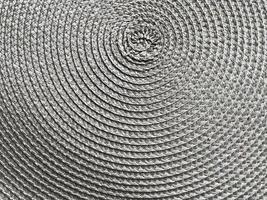 A close up of a circular pattern on a white surface photo
