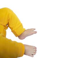 Baby Legs and Bottom in a Diaper and Yellow Panties, Top View, Copy Space photo