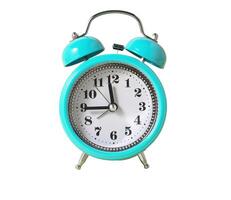Retro Alarm Clock. Close up One Classic Alarm Clock on a White Background photo
