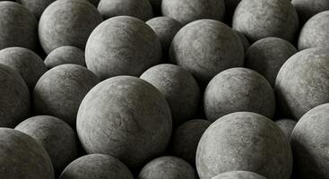 Smooth stone spheres with a textured surface photo