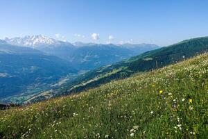 High altitude view of the mountain pastures and the Tarentaise valley in Bourg-Saint-Maurice in Savoie photo
