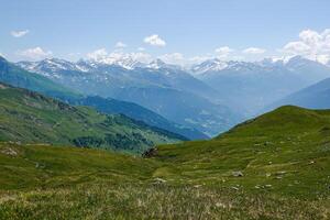 View of the Haute Tarentaise mountains at an altitude of over 2,000 meters in the Alps in Savoie photo