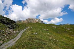 Hiking trail in the mountains in Savoie at Bourg-Saint-Maurice photo
