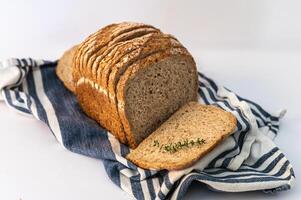 Rustic Homemade Bread on Striped Towel photo