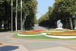Flat sculpture of a squirrel in the summer flowers in Gorky Park in Kharkov. photo